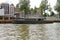 People on the dock landing on river cruise ships, Amsterdam, Net