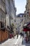 People doing shopping on famous Mouffetard district which is known as popular market street and nightlife spot in Latin Quarter in