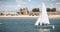 People dressed as sailor taking a boat lesson on the Ria Formosa, Tavira, Portugal