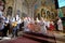 People dressed in traditional regional folk costumes in the church at the Mass on Thanksgiving day in Stitar, Croatia