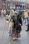 People dressed in vintage costumes and scary masks at Russian national festival `Shrove` on Revolution square in Moscow