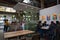 People drinking coffee and working at San Pedro Square Market in San Jose