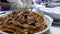 People eating congee with fried rice noodle on table