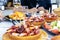 People eating Pulpo a la Gallega with potatoes. Galician octopus