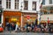 People eating traditional Belgian frites in Brussels