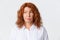 People, emotions and lifestyle concept. Close-up of indecisive, hesitant middle-aged redhead woman pondering choices