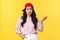 People emotions, lifestyle leisure and beauty concept. Skeptical and unimpressed stylish korean girl in red cap, raising