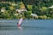 People engaged in active leisure Austrian mountain lake Worthersee