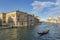 People enjoy the gondola ride at canale grande in classical hand driven gondola, Venice