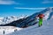 People enjoy ski and snowboard for winter holiday in Alps area with Mont Blanc as background, Les Arcs 2000, Savoie, France,