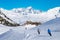 People enjoy ski and snowboard for winter holiday in Alps area with Mont Blanc as background, Les Arcs 2000, Savoie, France,