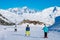 People enjoy ski and snowboard for winter holiday in Alps with Mont Blanc as background, Les Arcs 2000, Savoie, France, Euro