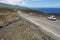 People enjoy the view to the asphalt road over volcanic lava in Sainte-Rose De La Reunion, France.