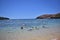 People enjoying beach activities and snorkling in Hanauma Bay, Hawaii