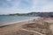 People enjoying the beach in Swanage, Dorset in the UK