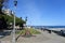 People enjoying a beautiful evening with views of Monterey Bay, along the bea