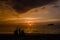 People enjoying the beautiful four colors sunset in the Rodadero beach, Santa Marta, Colombia