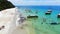 People enjoying beautiful turquoise water in tropical beach