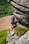 People enjoying climbing on Bamford Edge