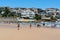 People enjoying hot sunny summer day on Bondi beach in Sydney NSW Australia