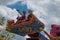 People enjoying The Magic Carpets of Aladdin sign in Magic Kingdom at Walt Disney World  2