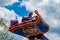 People enjoying The Magic Carpets of Aladdin sign in Magic Kingdom at Walt Disney World  4