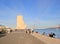 People enjoying Monument of Discoveries and Tagus River at Lisbon, Portugal