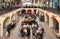 People enjoying Paella in the Covent Garden Apple Market, is the big attraction for its restaurants, pubs, market stalls and shop