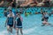 People enjoying pool with waves at Aquatica 1