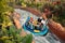 People enjoying ride in Infinity Falls at Seaworld Marine Theme Park.