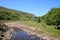 People enjoying River Swale on sunny June day