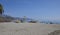 People enjoying the small beach at Nerja, on the Spanish Mediterranean Coast near Malaga.