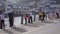 People enjoying some crab fishing from the harbour East Looe, Cornwall, UK