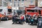 People enjoying street food in Ely`s Yard, Brick Lane, East London, UK