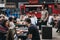 People enjoying street food in Ely`s Yard, London, UK.