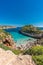 People enjoying sun at Es calo des Moro beach Clasified as one of the best beaches in the world.