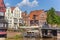 People enjoying the sun in the historic harbor of Luneburg