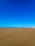 People enjoying a sunny summer day at Isla Canela Beach, in Ayamonte, Spain