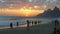 People enjoying the sunset at Ipanema Beach, Rio de Janeiro