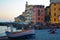 People enjoying the sunset on the small beach of Boccadasse, fishermen district