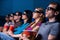 People enjoying three-dimensional movie.