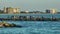 People enjoying vacation time on Nokomis jetty pier in Florida. Seaside summer activities on fresh air