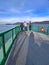 People enjoying the view from the rear of an Anacortes Ferry in Washington