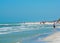 People enjoying the white sandy beach at Treasure Island Beach on the Gulf of Mexico, Florida