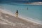 People enojy the beach at Es Pujols beach in Formentera in summer 2021