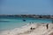People enojy the beach at Es Pujols beach in Formentera in summer 2021