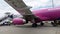 People enter Wizzair Airplain