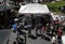 People examining the goods on display at the famous Feira da Ladra (Flea Market) in Lisbon, Portugal.