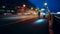 People exercise at night on a bicycle