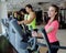 People exercising on a cardio training machines